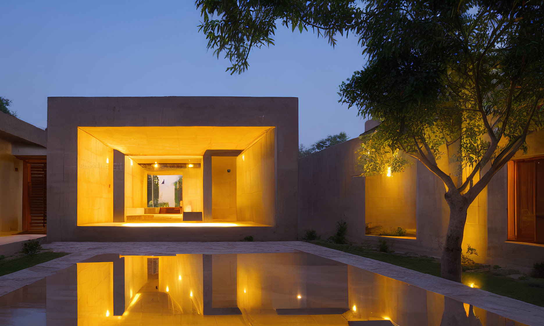 Modern House with Illuminated Interiors, Exterior Walkway, Pool Reflection at Dusk