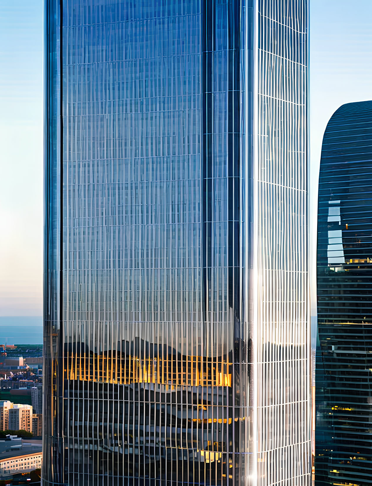 Reflective glass skyscrapers in golden sunset light