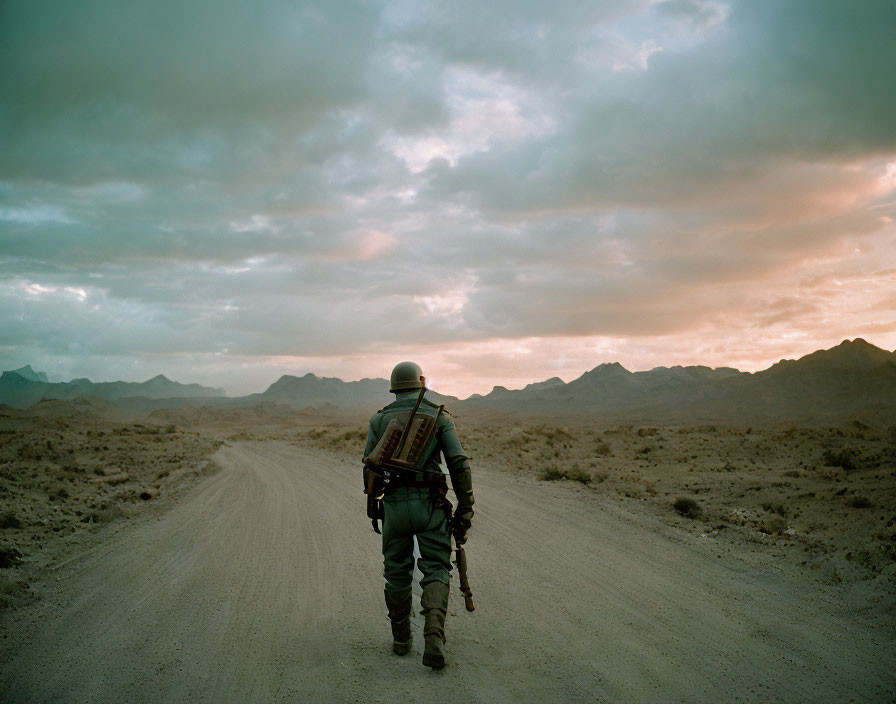 Solitary Figure in Armor Walking on Deserted Road at Sunset