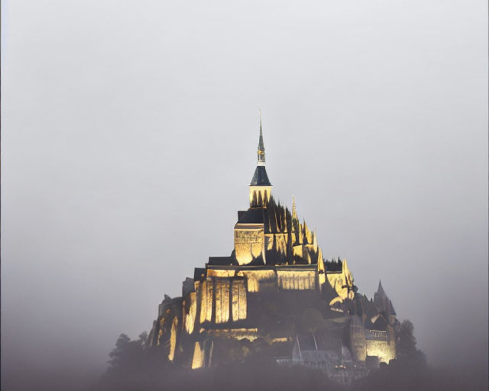 Mystical autumn castle on rocky hill with golden leaves