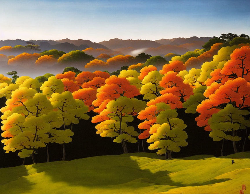 Vibrant autumn trees in yellow and orange against misty hills