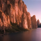 Colorful alien landscape with tall pink and orange plants, mirrored waters, flying birds, and red planet