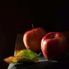 Vibrant multi-colored grapes on dark background with soft glow