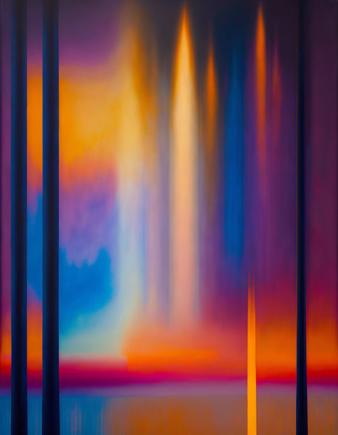 Blurred abstract image with vibrant vertical lines in blue, purple, orange, and yellow.