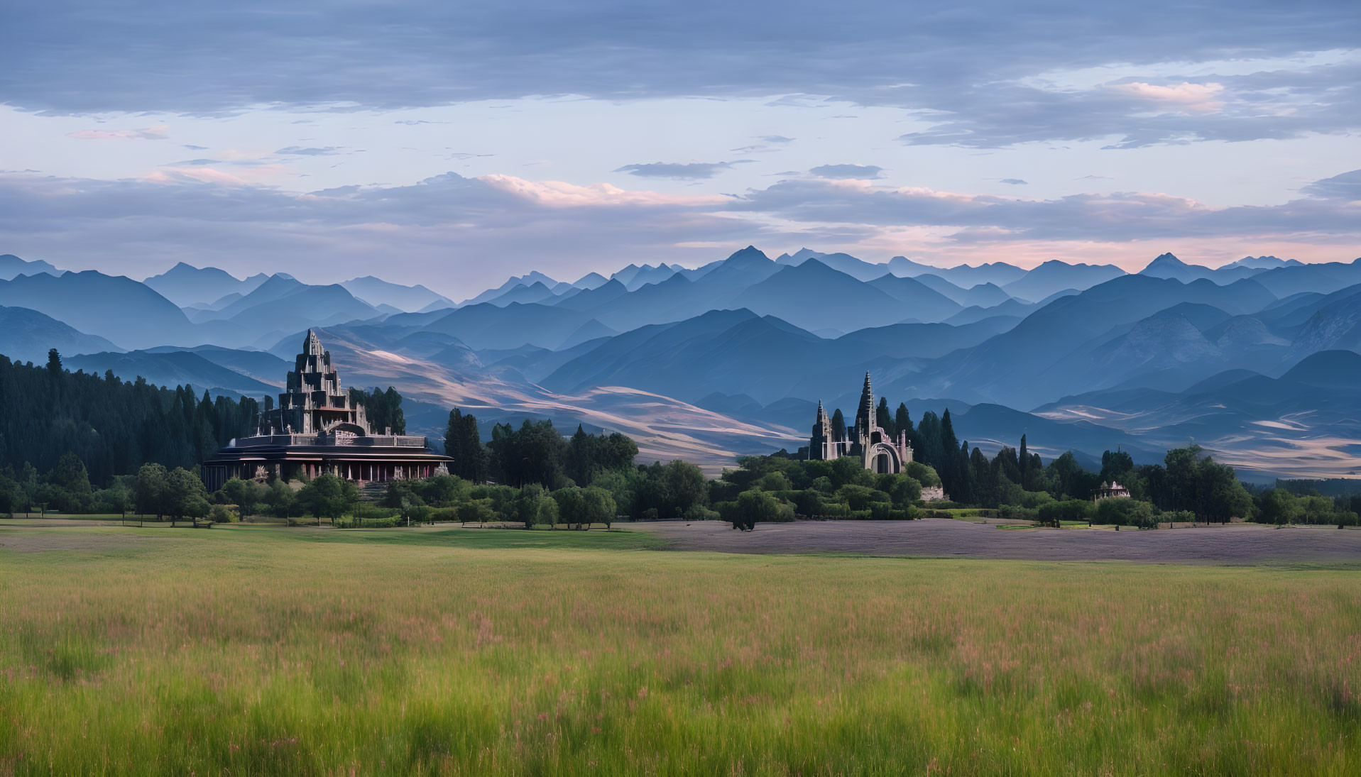 Orthodox-style churches in lush green field with layered mountain ridges at dusk