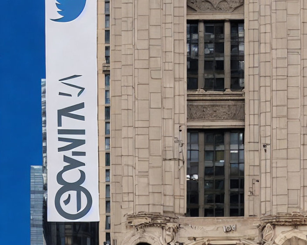 Classic Beige Stone Building Twitter Banner on Clear Blue Sky