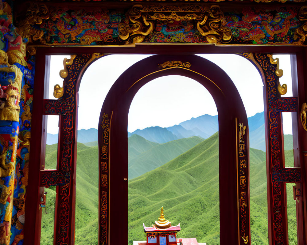 Traditional archway frames vibrant red temple with golden roof amidst green hills and blue sky