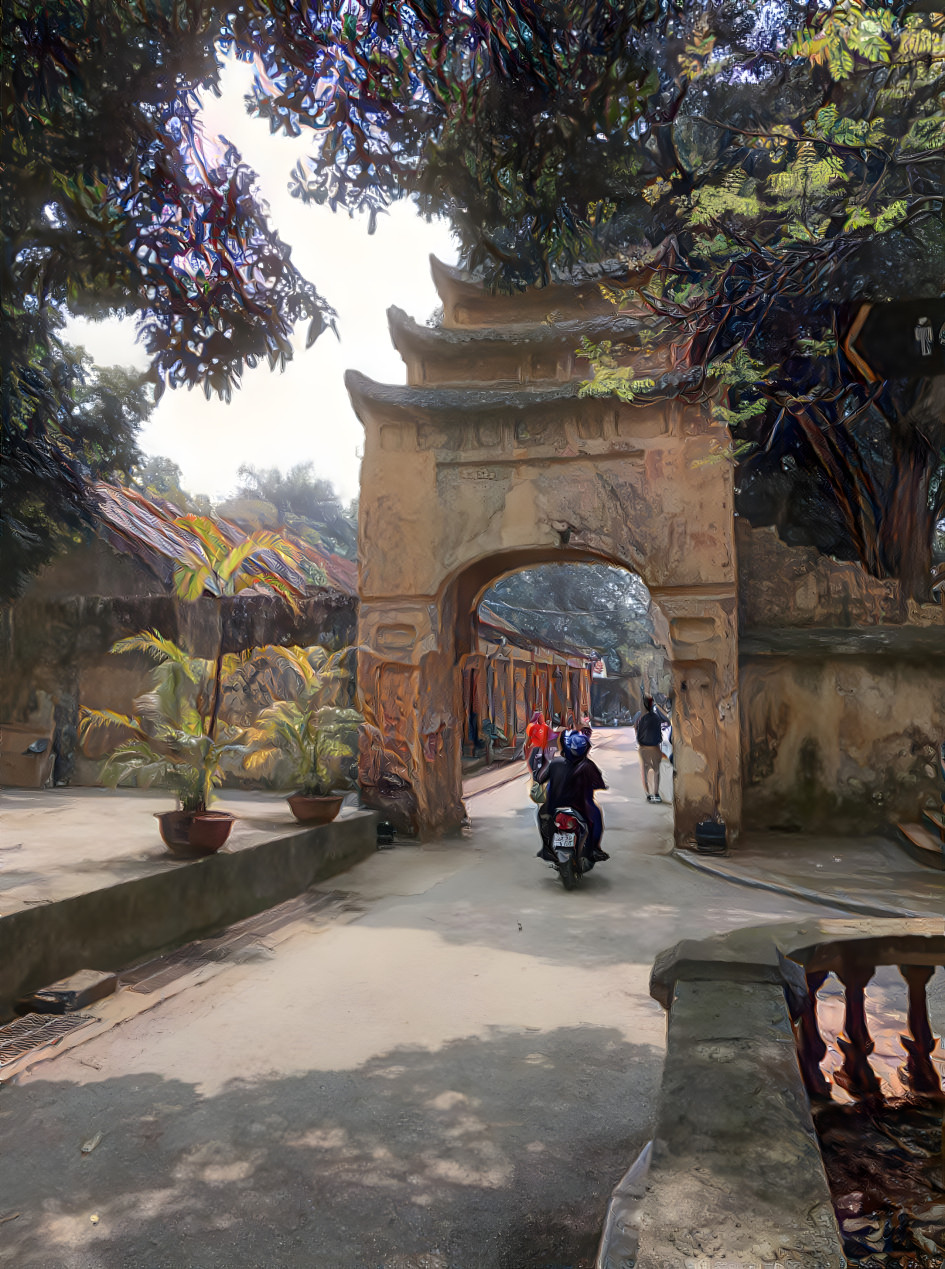 motorbike going through citadel gate