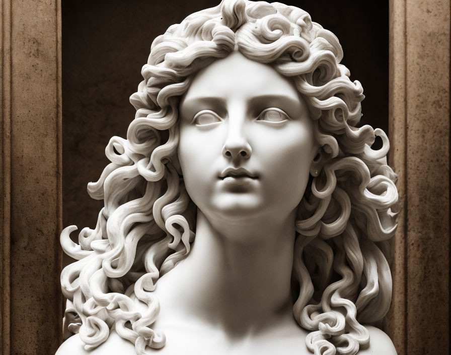 Marble sculpture of woman with flowing curly hair and serene expression