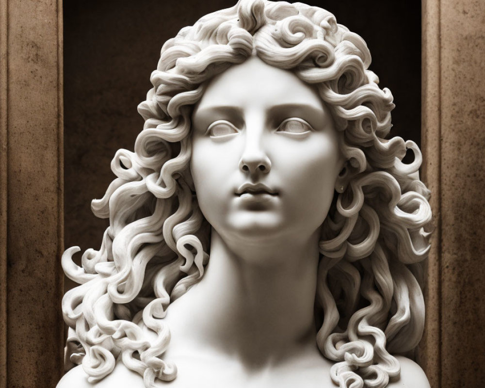 Marble sculpture of woman with flowing curly hair and serene expression