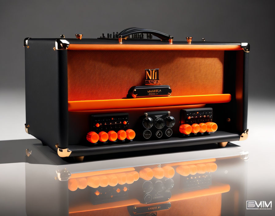 Orange and Black Guitar Amplifier with Dials and Switches on Reflective Surface