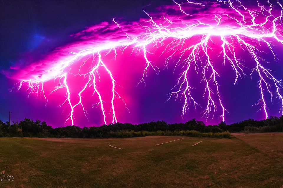 Purple Lightning Storm Illuminating Night Sky