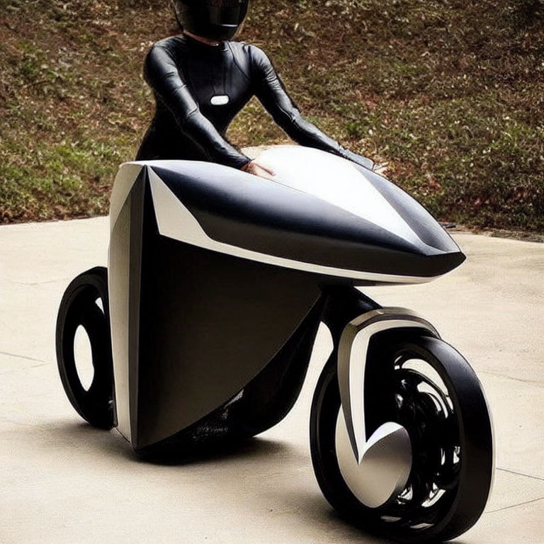 Person in black bodysuit on futuristic angular motorcycle