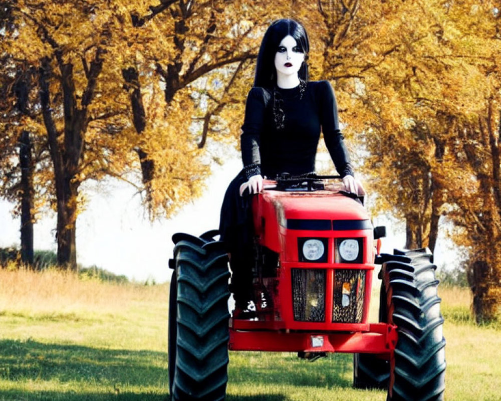 Person in black and white makeup on red tractor in field with golden-leaved trees