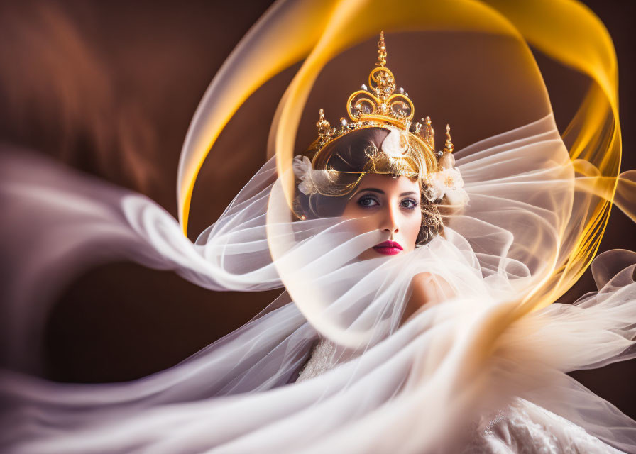 Ornately crowned woman with swirling fabric on warm background