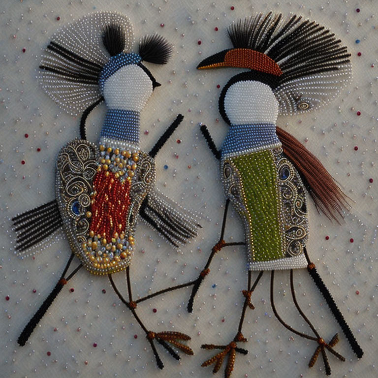 Beaded tribal art figures with elaborate headdresses and colorful attire