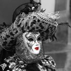 Elaborate Feathered Mask and Headdress in Venetian-Style Carnival Costume