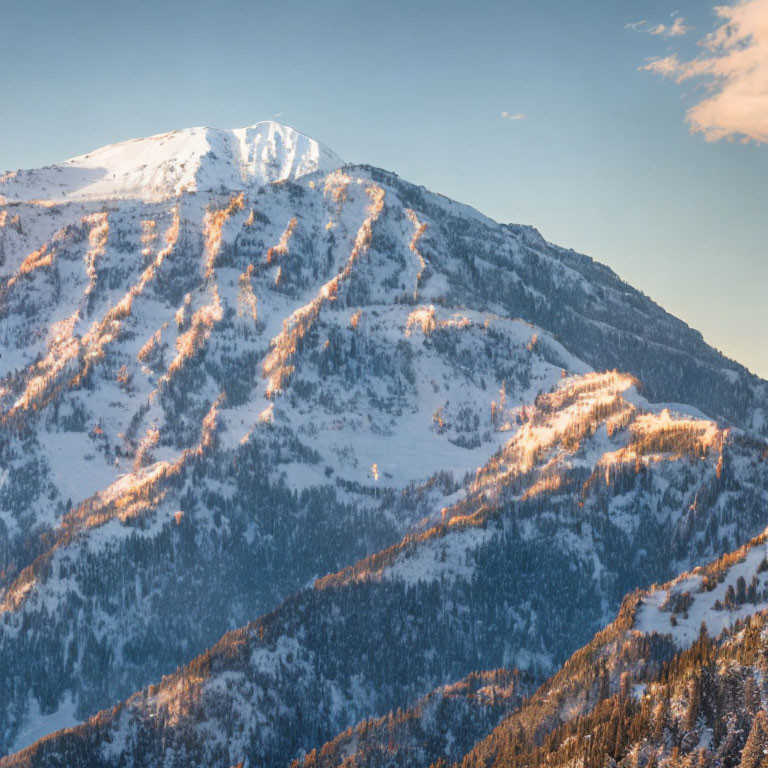 Majestic snow-covered mountain landscape under clear blue sky