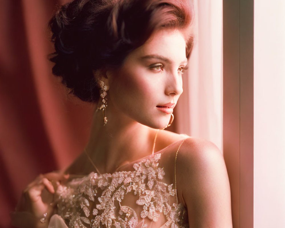 Elegant woman with updo admires view in warm light