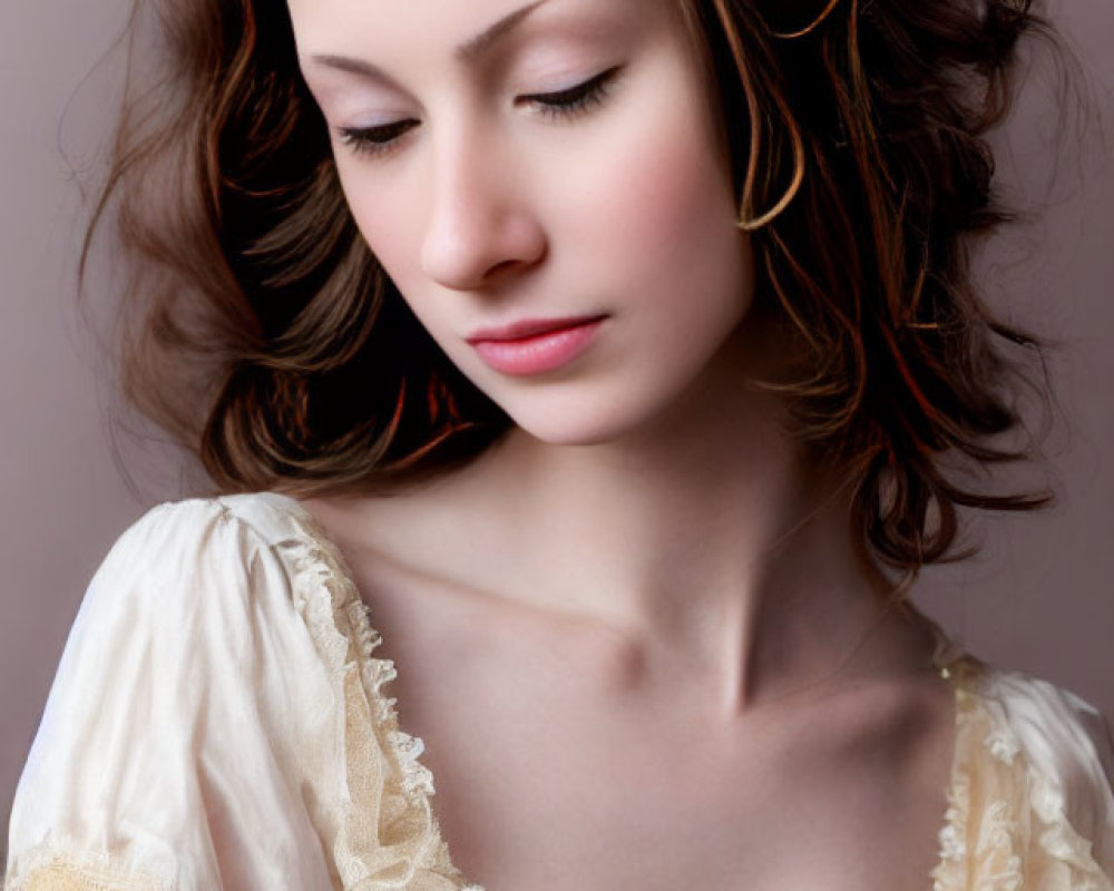 Curly Haired Woman in Vintage Cream Dress on Muted Background