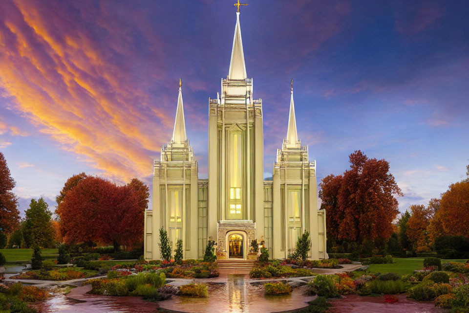 Golden spire temple at sunset with autumn trees and gardens