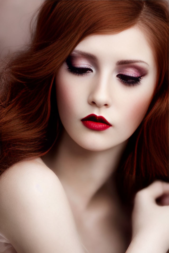 Portrait of Woman with Red Hair and Dramatic Makeup