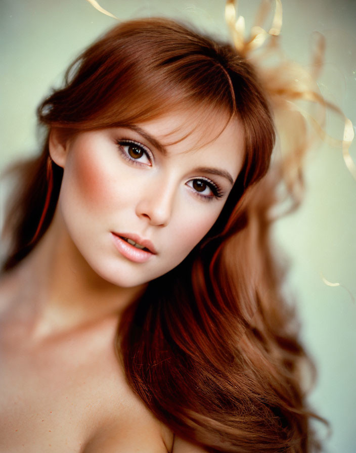 Portrait of Woman with Long Wavy Hair and Serene Expression