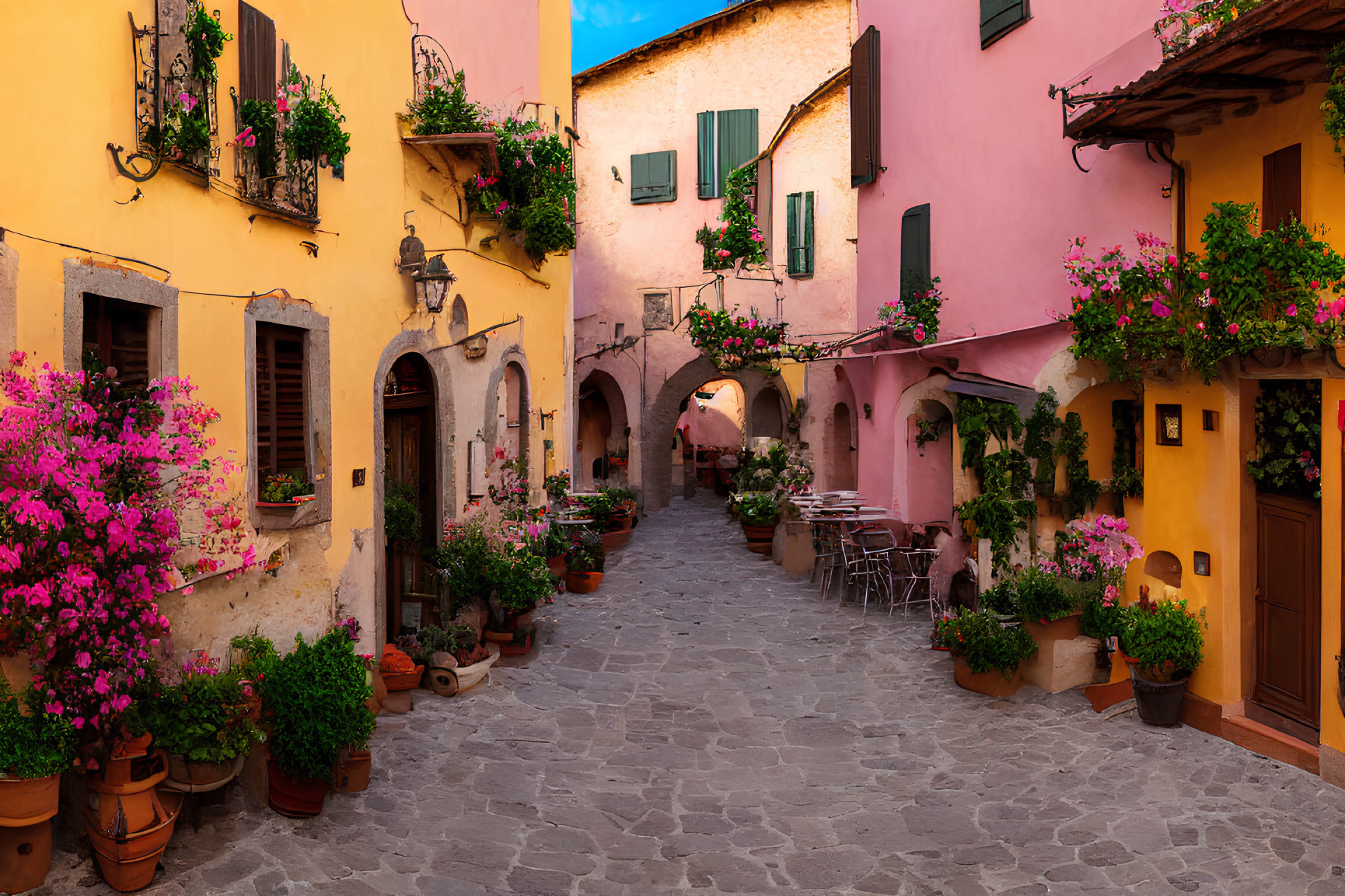 Colorful European Alley with Yellow and Pink Walls and Green Shutters