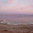 Tranquil Dusk Landscape with Pink-Hued Sky