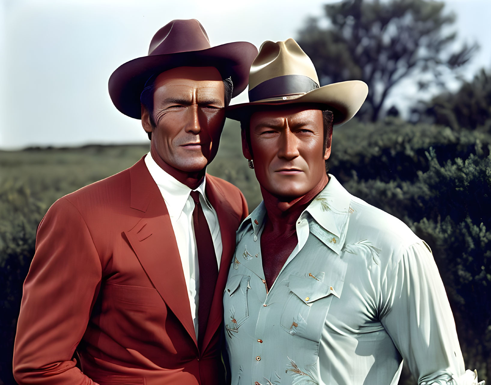 Cowboy attire: Two men in red and green outfits against natural backdrop