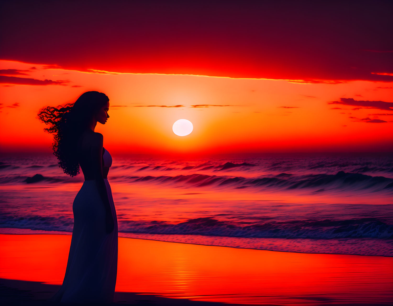 Woman silhouette on beach at sunset with red and orange sky