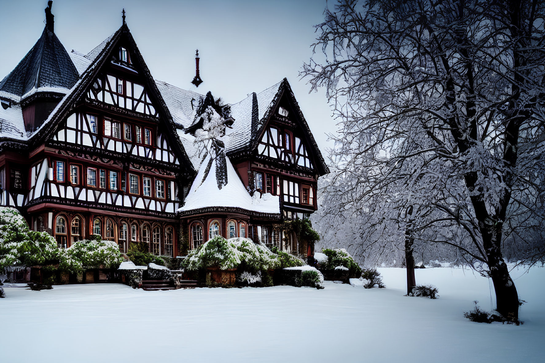 Half-Timbered House Covered in Snow in Winter Landscape