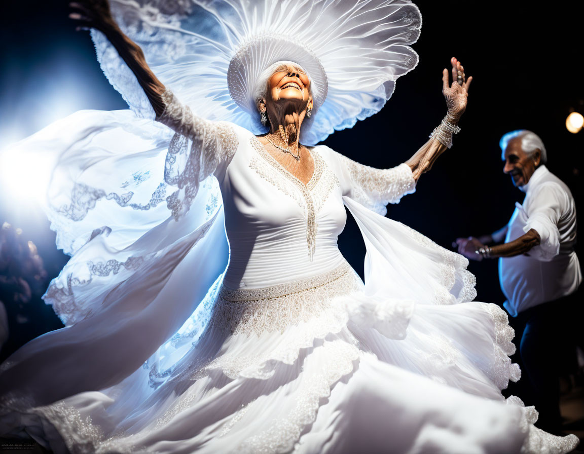 Elderly couple dancing joyously in white attire