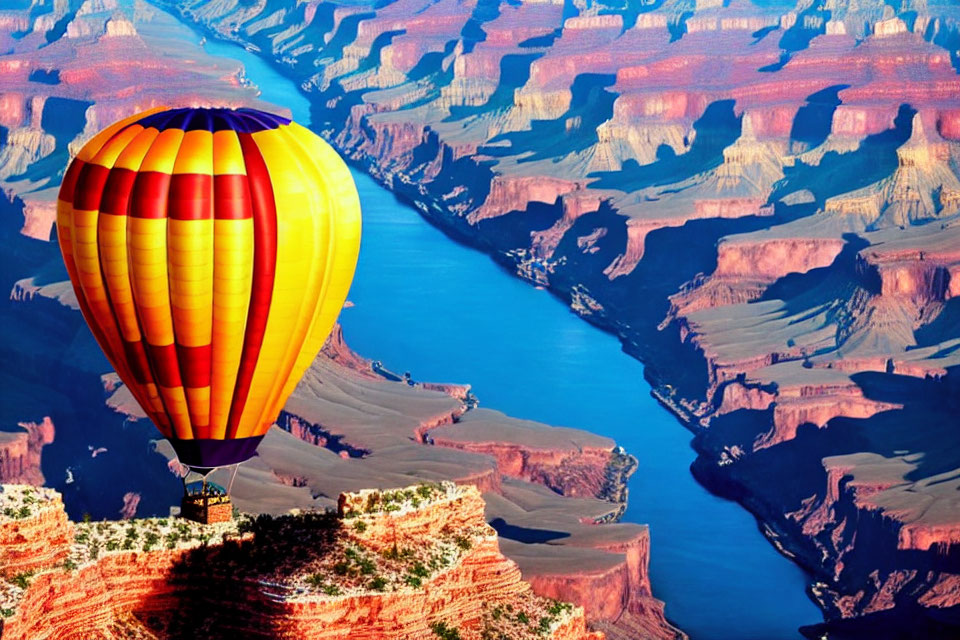 Colorful Hot Air Balloon Over Grand Canyon with Colorado River View