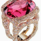 Luxurious Gold Ring with Large Pink Gemstone and Diamond Accents