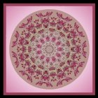 Circular ornate mandala with intricate floral patterns in purple, pink, and green on glowing pink backdrop