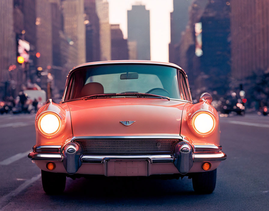 Classic Red Car with Tailfins in Urban Sunset Scene