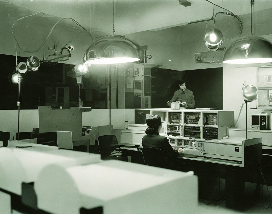 Vintage computer room with large equipment and tape drives