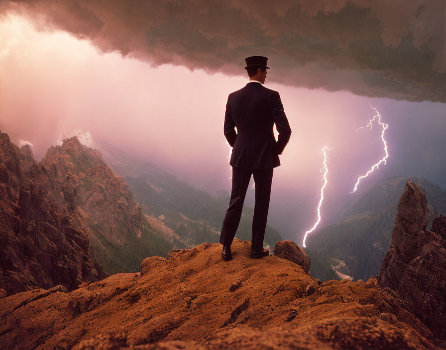 Person in suit and hat on mountain gazes at lightning in stormy sky