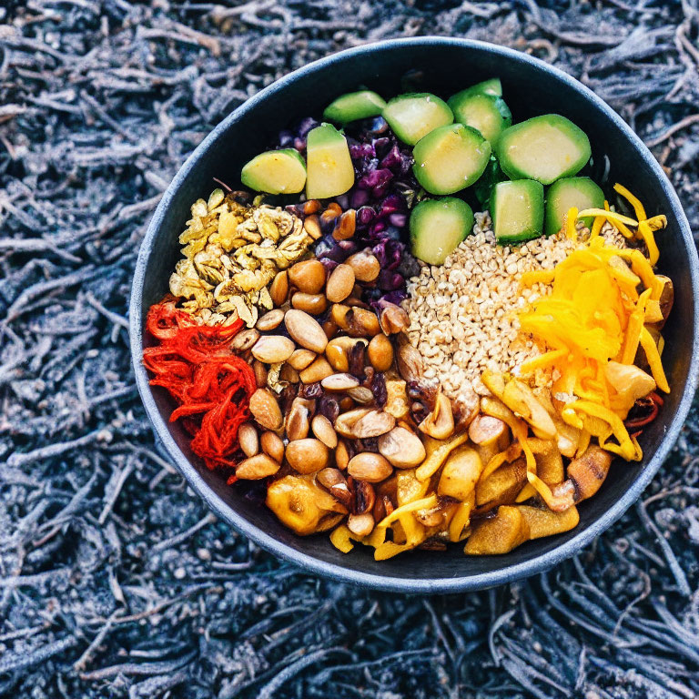 Nutritious Bowl with Cucumbers, Granola, Nuts, Seeds, and D