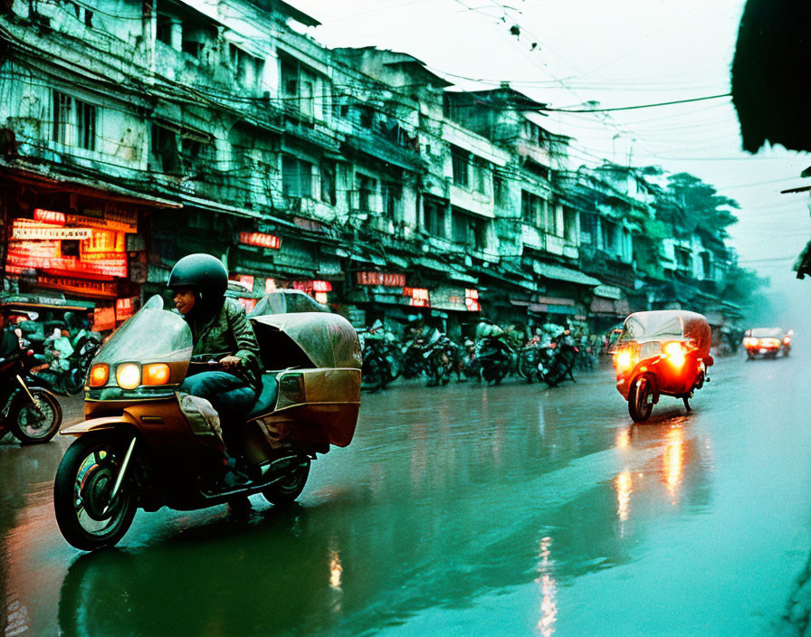 Dusk street scene: motorcycles, neon signs, old buildings