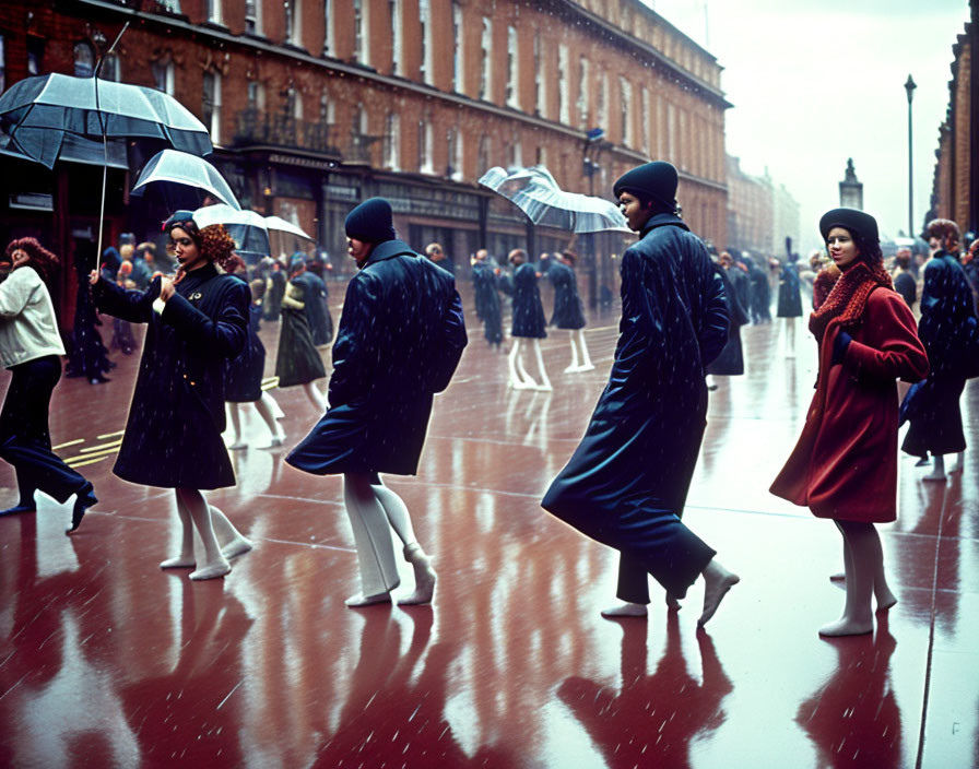 City scene: People with umbrellas on wet pavement, vibrant clothing, rainy day movement.