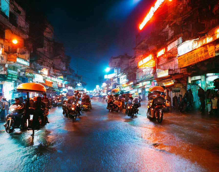 Vibrant urban night scene with neon signs and motorbikes