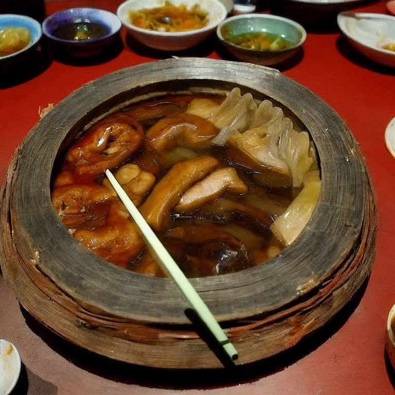 Vegetarian Asian dish with mushrooms, tofu, and vegetables in brown sauce