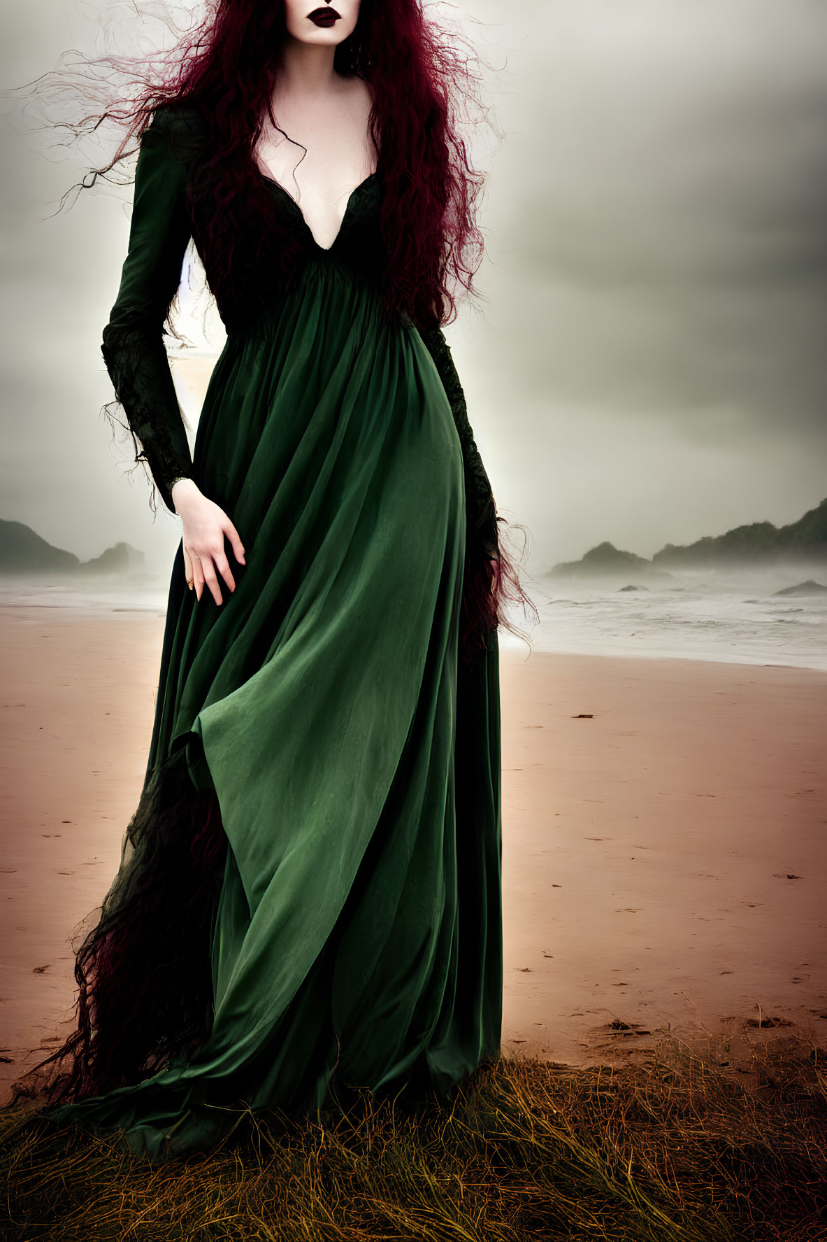 Long Red-Haired Person in Green Dress on Beach under Cloudy Sky