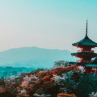 Japanese Pagoda with Cherry Blossoms and Mount Fuji in Blue Sky