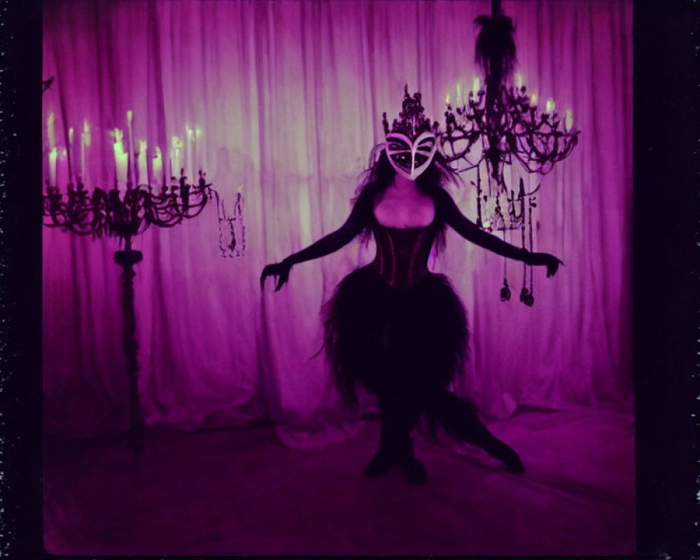 Person in dramatic costume with mask and feathers against purple backdrop with chandeliers.