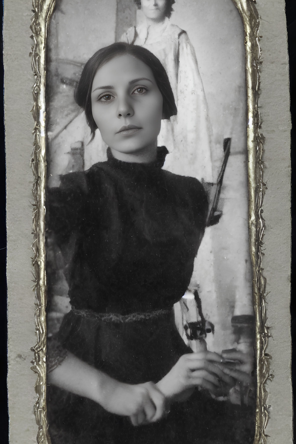 Vintage monochrome portrait of woman in dark turtleneck, framed with ornate gold border; second