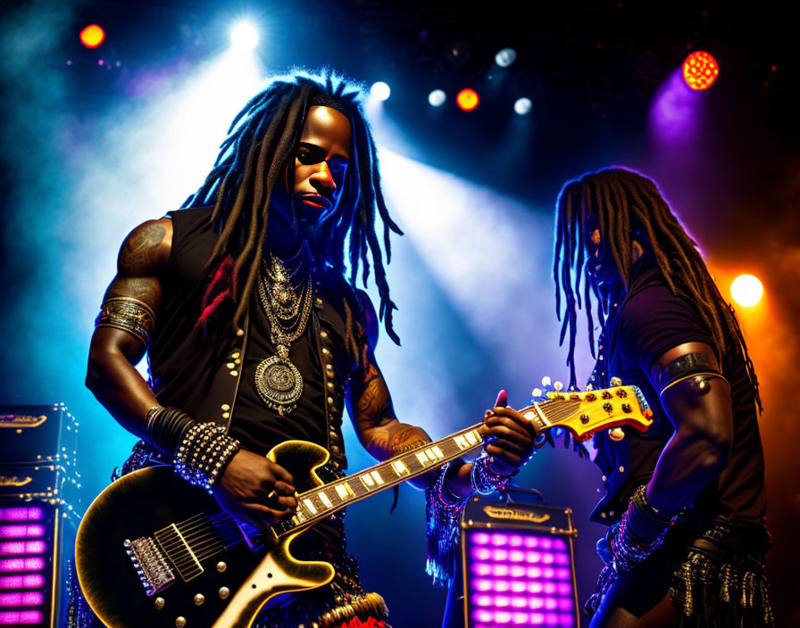 Dreadlocked guitarists in vibrant stage setting at live concert