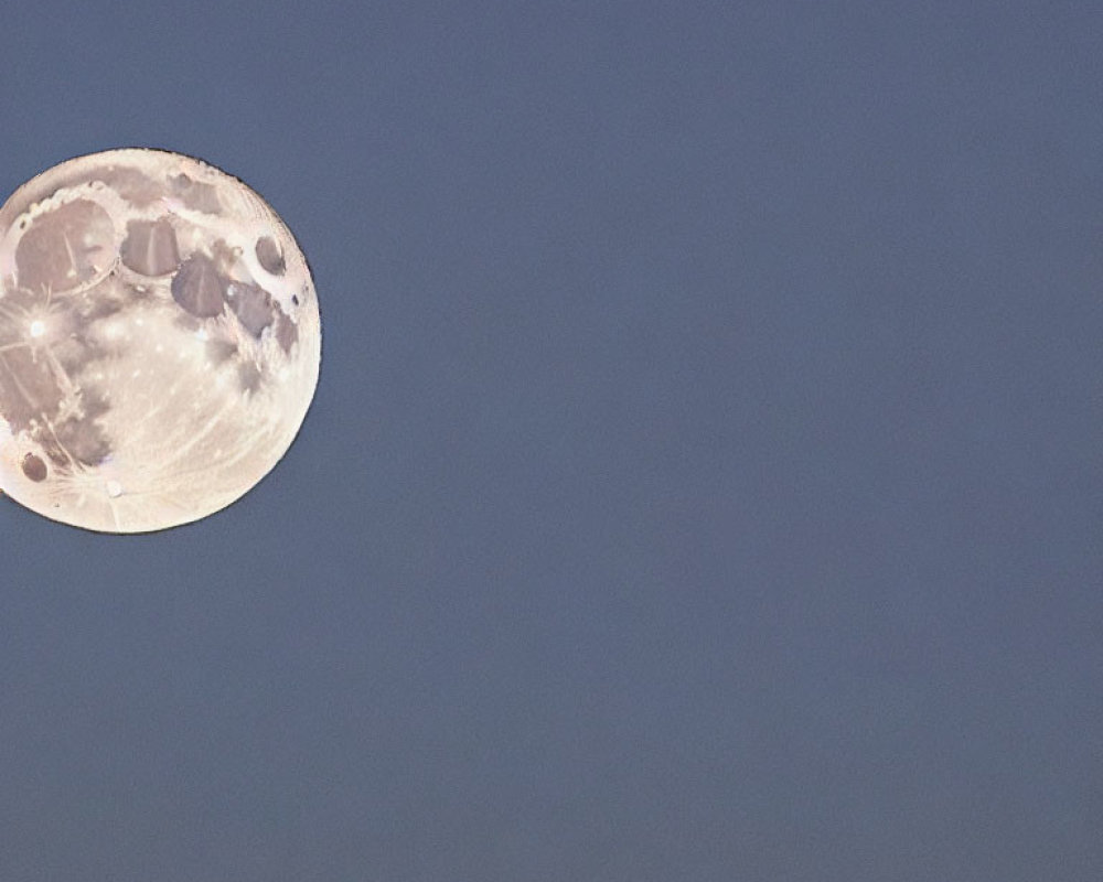 Detailed Image: Full Moon with Craters in Twilight Sky